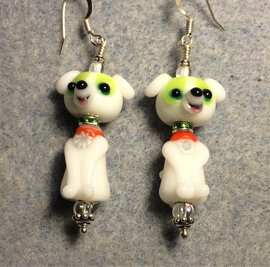 White lamp work puppy dog bead earrings adorned with green rhinestone rondelle “collars” and clear Czech glass beads.