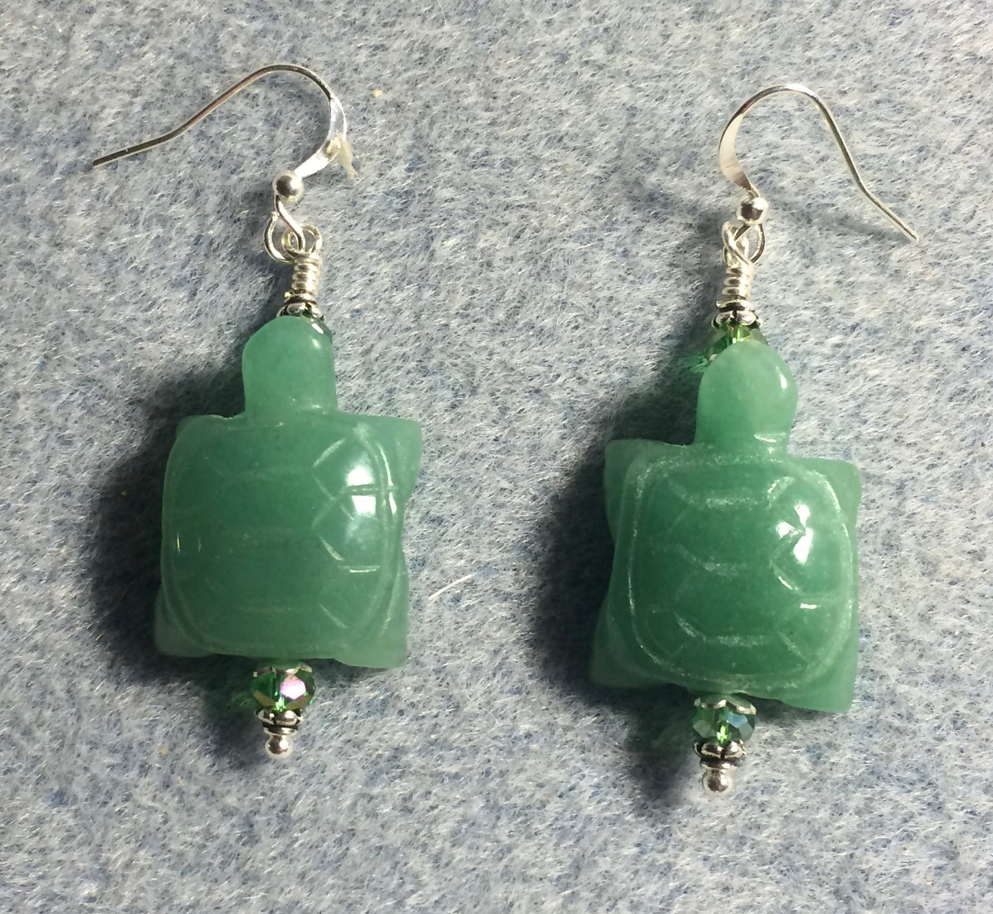 Green aventurine gemstone turtle bead earrings adorned with green Chinese crystal beads.