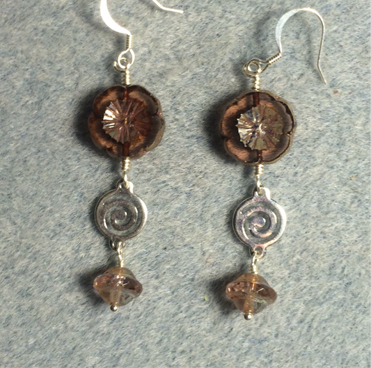 Translucent violet Czech glass pansy bead earrings adorned with silver swirly connectors and violet Czech glass Saturn beads.