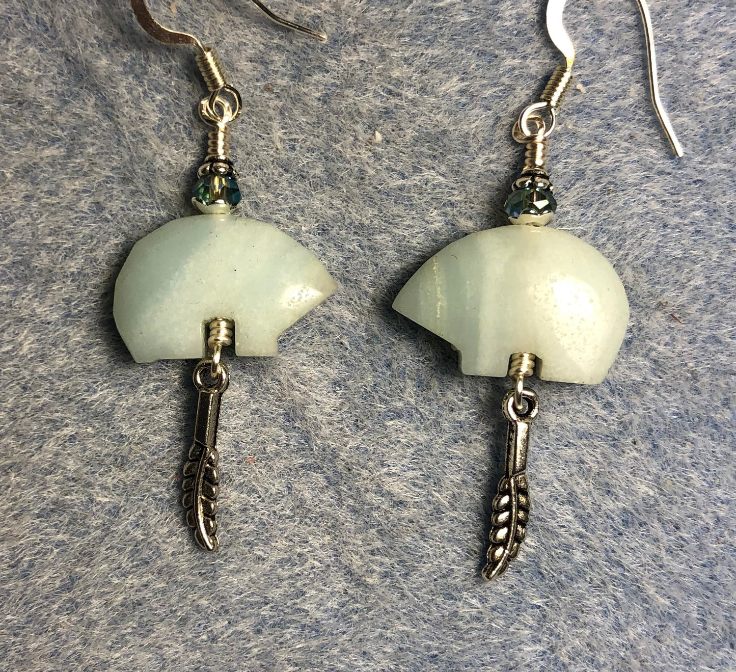 Light green amazonite gemstone Zuni bear fetish bear earrings adorned with light green crystal beads and tiny silver feather charms.