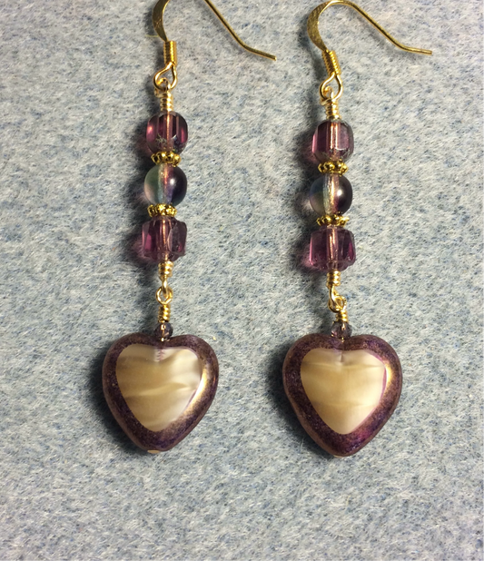 Purple and tan Czech glass heart bead earrings adorned with purple Czech glass beads.