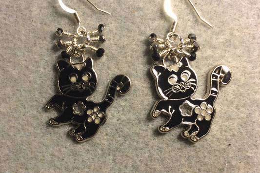 Black enamel cat charm earrings adorned with tiny dangling black and silver Chinese crystal beads.
