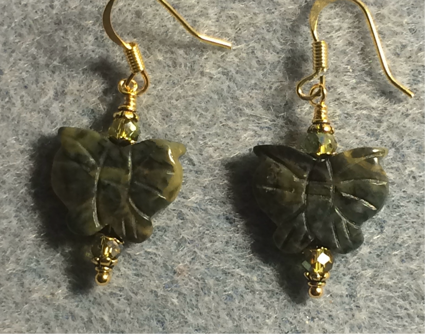 Green quartz gemstone butterfly bead earrings adorned with sparkly green Chinese crystal beads.