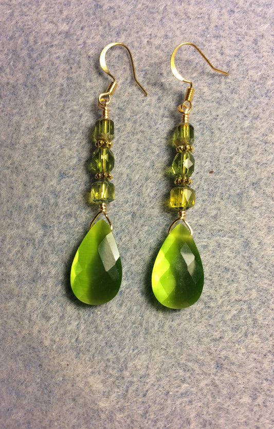 Olive green fiber optic briolette bead earrings adorned with olive green Czech glass beads.