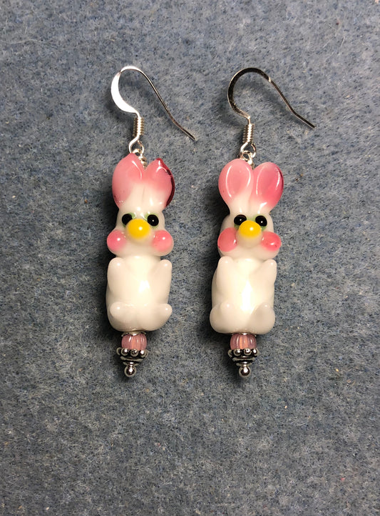 White and pink lamp work bunny rabbit bead earrings adorned with pink Czech glass beads.