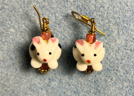 White and pink lamp work bunny rabbit bead earrings adorned with pink Czech glass beads.