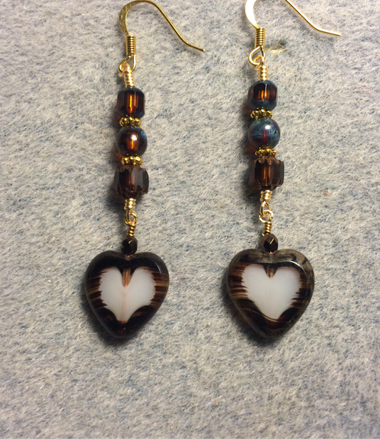 Brown and white Czech glass heart bead earrings adorned with brown Czech glass beads.