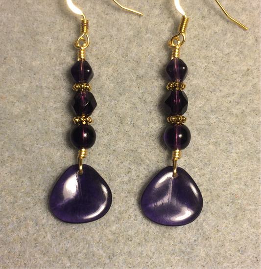 Dark purple Czech glass rose petal earrings adorned with dark purple Czech glass beads.