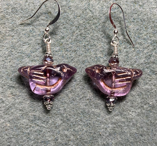 Translucent violet (with copper wash) Czech glass bird bead earrings adorned with violet Chinese crystal beads.