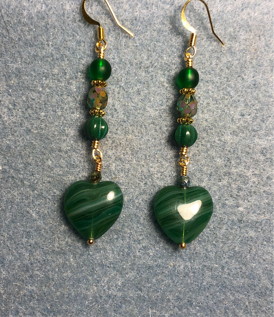 Opaque striped emerald green Czech glass heart bead earrings adorned with emerald green Czech glass beads.