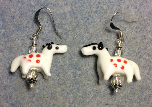 Opaque white and red lamp work spotted horse bead earrings adorned with clear Czech glass beads.