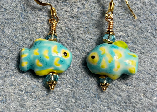 Small turquoise and yellow ceramic fish bead earrings adorned with turquoise Chinese crystal beads.
