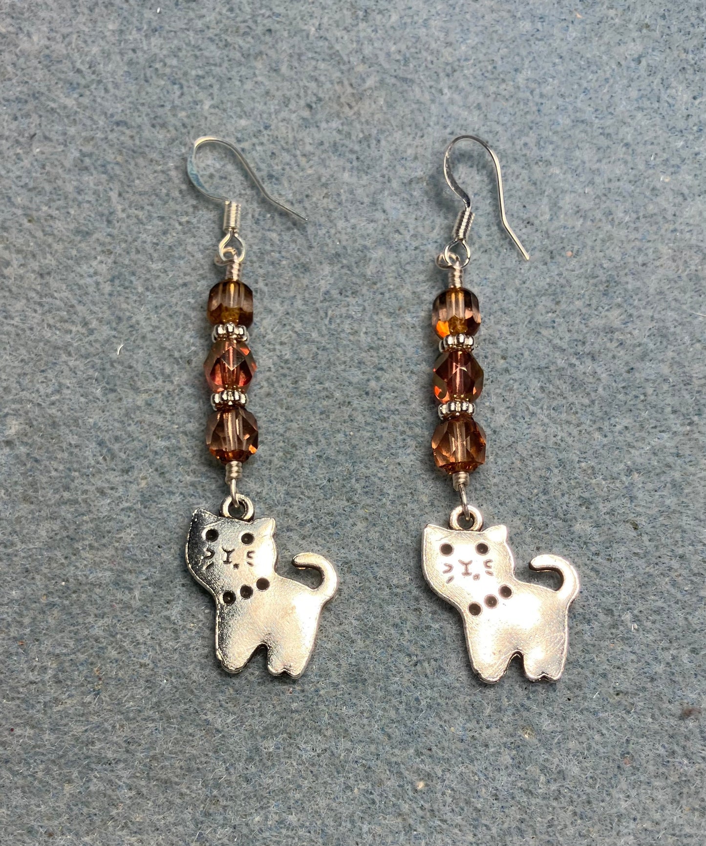 Silver cat charm earrings adorned with rose gold Czech glass beads