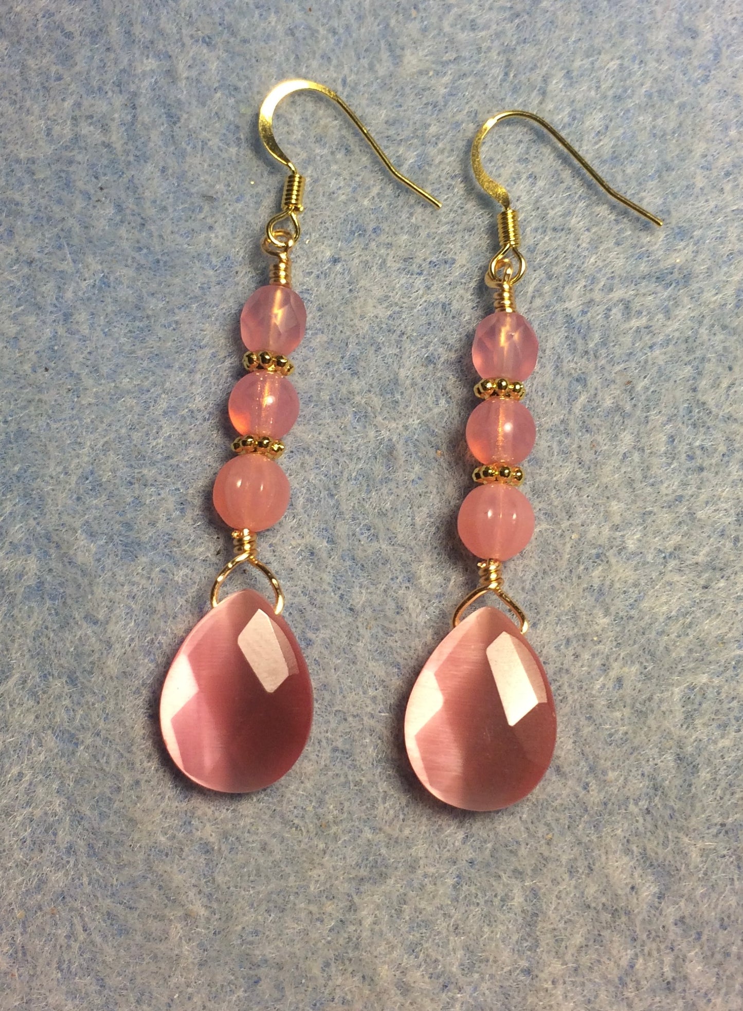 Milky pink fiber optic briolette bead earrings adorned with milky pink Czech glass beads.