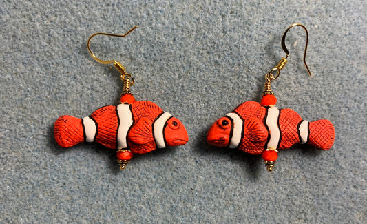 Orange, black, and white ceramic striped clownfish bead earrings adorned with orange Chinese crystal beads.