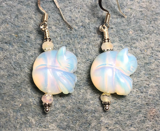 White opalite gemstone sleeping cat bead earrings adorned with white Chinese crystal beads.