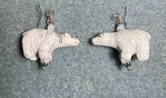 White ceramic polar bear bead earrings adorned with white Czech glass beads.