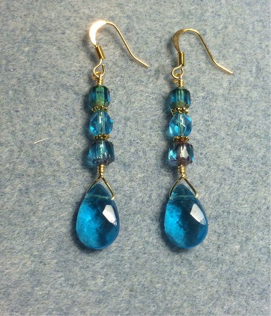 Turquoise Czech glass briolette bead earrings adorned with turquoise Czech glass beads.