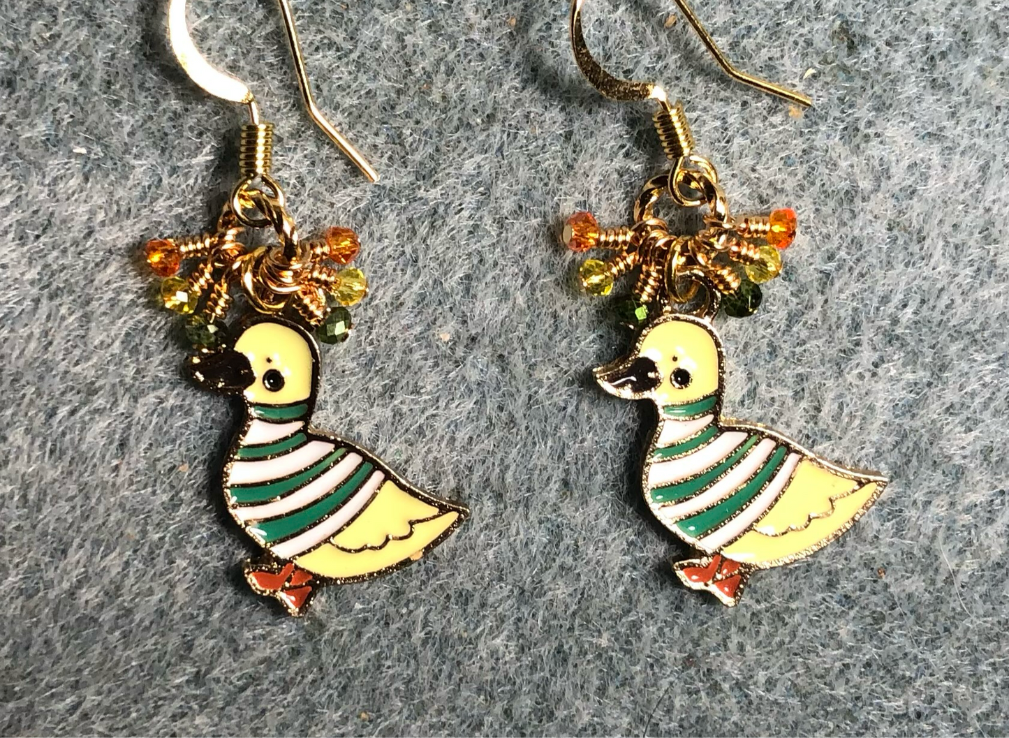 Yellow, green, and orange enamel duck charm earrings adorned with tiny dangling yellow, green, and orange Chinese crystal beads.