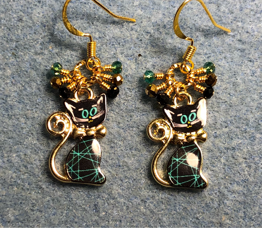 Teal, black, and gold enamel cat charm earrings adorned with small dangling teal, black, and gold Chinese crystal beads.