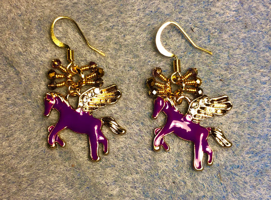 Purple and gold enamel and rhinestone Pegasus (flying horse) charm earrings adorned with tiny dangling purple and gold Chinese crystal beads.