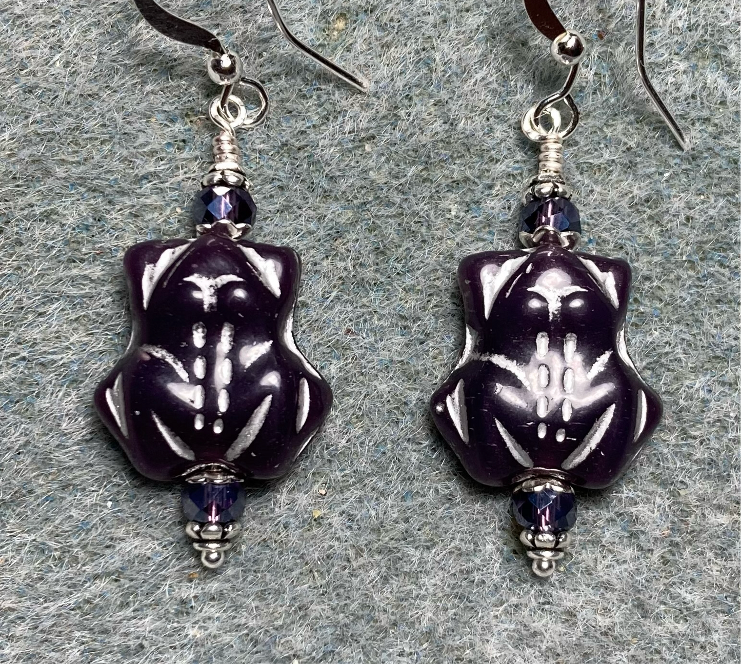 Opaque purple (with silver inlay) Czech glass frog bead earrings adorned with purple Chinese crystal beads.