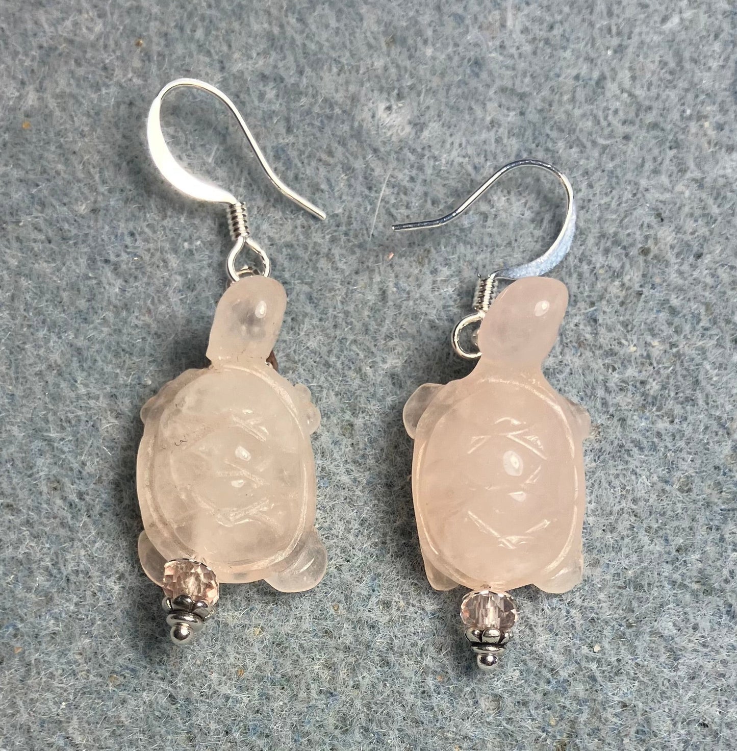 Pink rose quartz gemstone turtle bead earrings adorned with pink Chinese crystal beads.