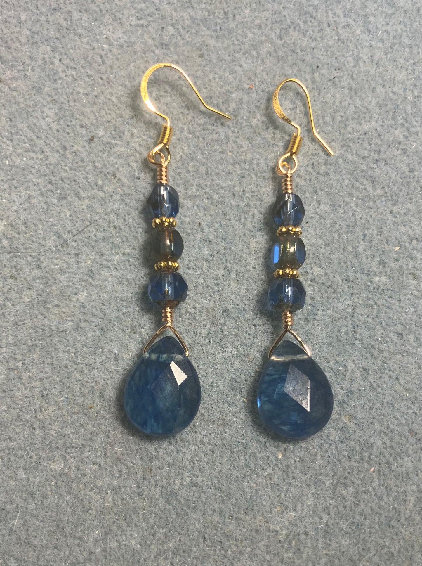 Blue mottled Czech glass briolette bead earrings adorned with blue Czech glass beads.