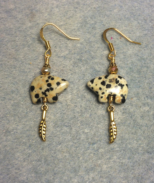 Dalmatian jasper gemstone Zuni bear fetish bead earrings adorned with tan crystal beads and tiny gold feather charms.