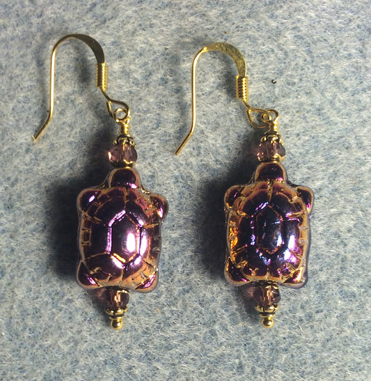 Metallic purple pink Czech glass turtle bead earrings adorned with purple Chinese crystal beads.