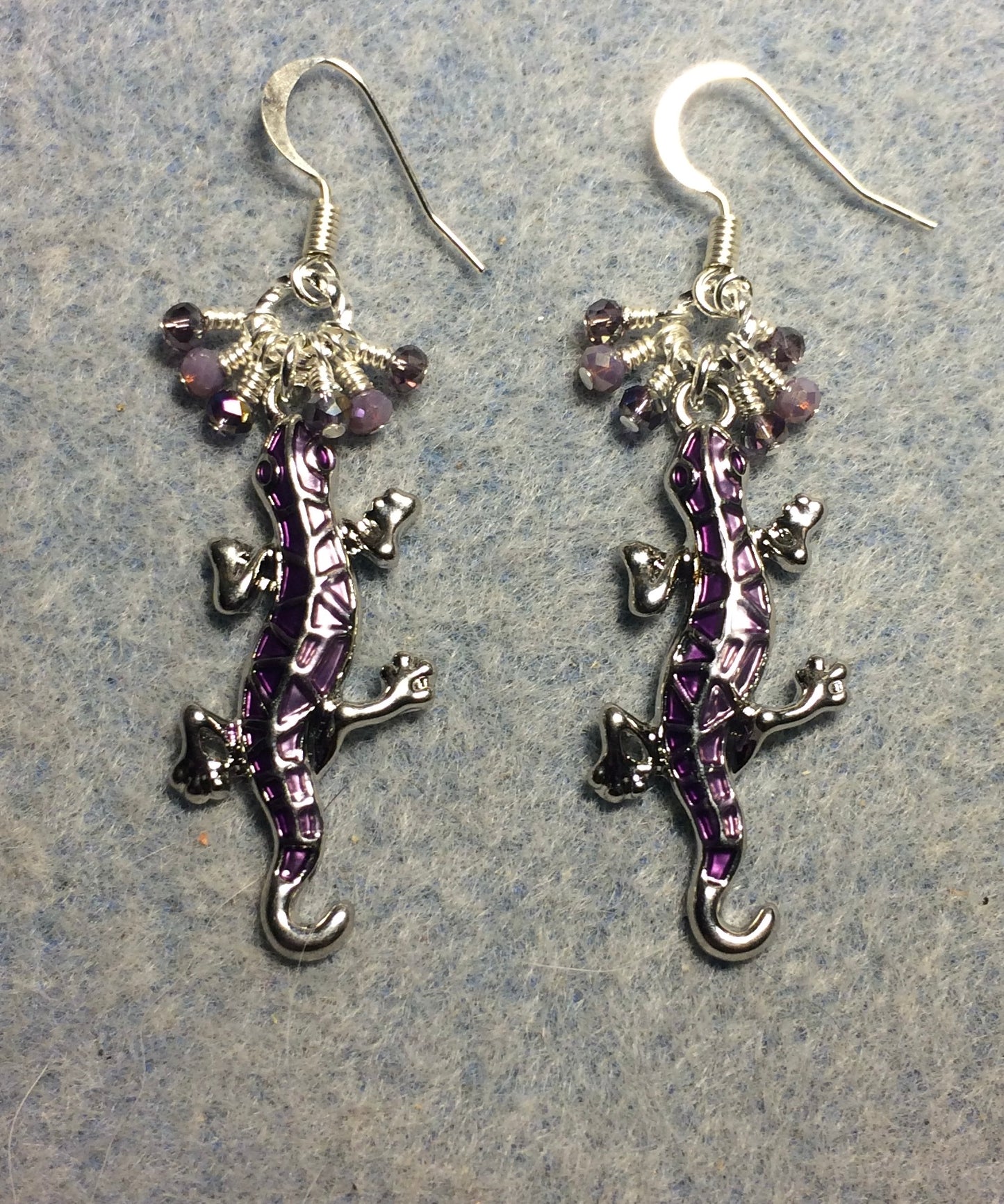 Silver and purple enamel lizard charm earrings adorned with small dangling purple Chinese crystal beads.