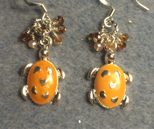 Silver and orange enamel turtle charm earrings adorned with tiny dangling orange and tangerine Chinese crystal beads.