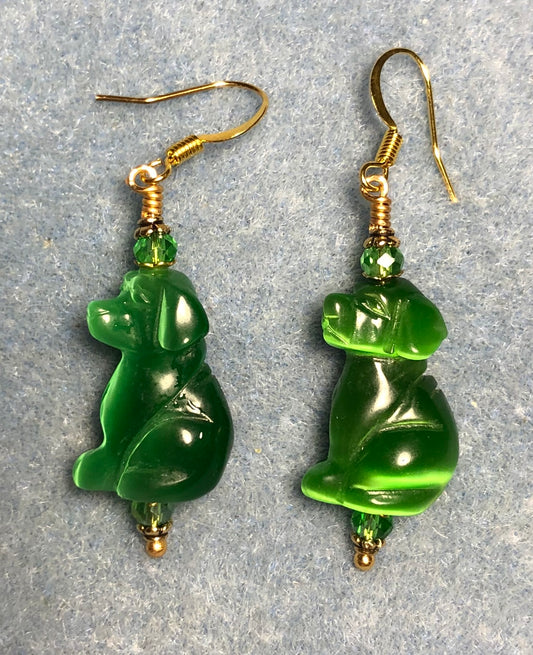 Emerald green fiber optic (cat’s eye) dog bead earrings adorned with emerald green Chinese crystal beads.