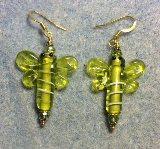 Lime green lamp work dragonfly bead earrings adorned with lime green Chinese crystal beads.