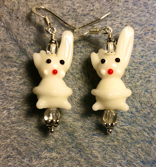 Opaque white lamp work bunny rabbit bead earrings adorned with clear Czech glass beads.