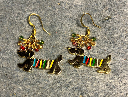 Gold enamel striped dachshund  charm earrings adorned with tiny dangling amber, red, and green Chinese crystal beads.