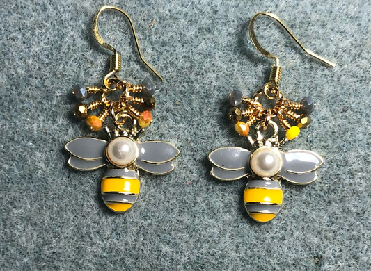 Gray and golden yellow enamel and pearl striped honeybee charm earrings adorned with tiny dangling golden yellow, gray, and gold Chinese crystal beads.