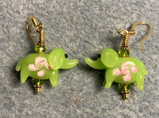 Lime green and pink lamp work elephant bead earrings adorned with lime green Chinese crystal beads.