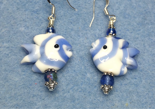 Light blue and white lamp work striped angelfish bead earrings adorned with light blue Czech glass beads.