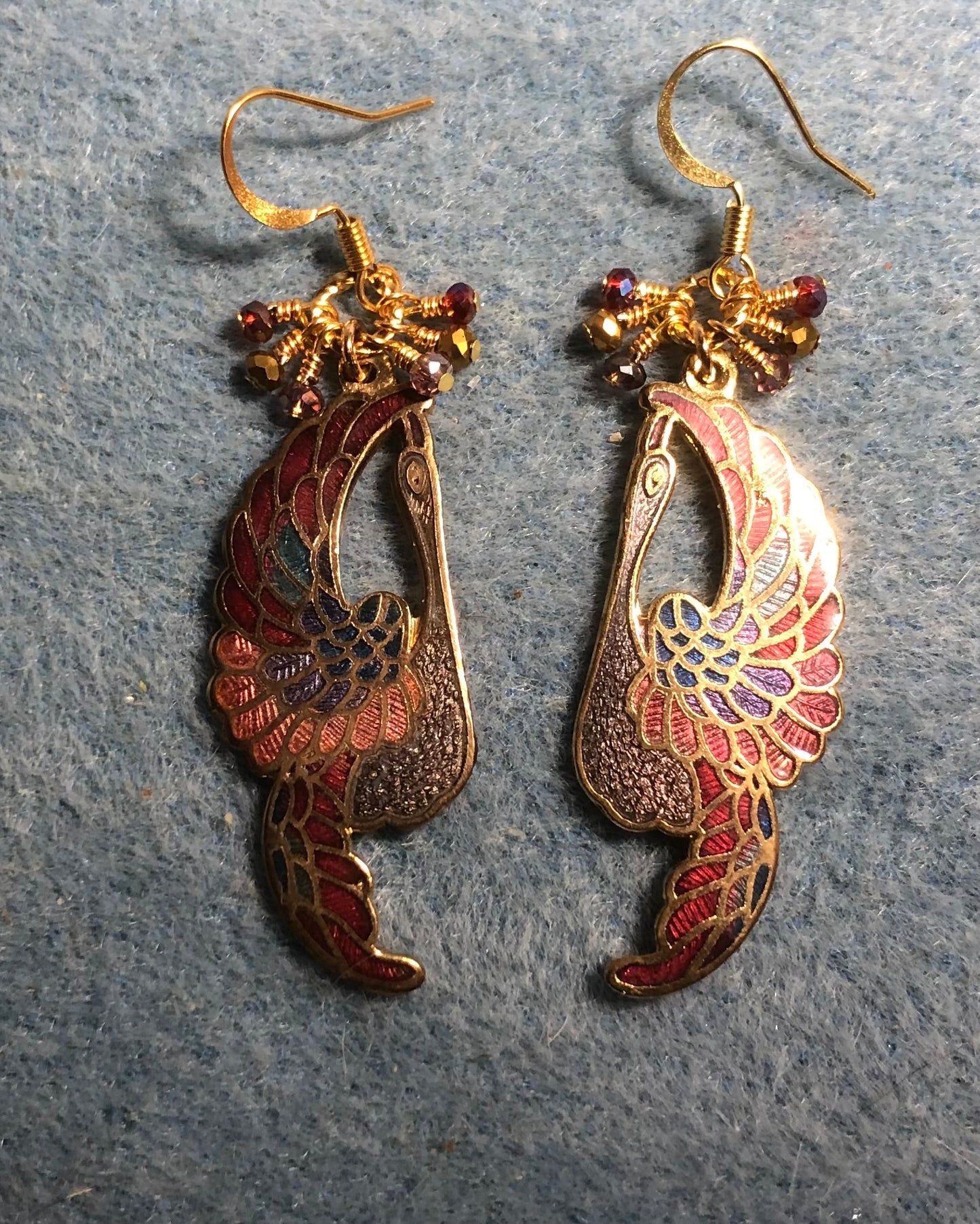 Dark red, violet, and gold cloisonné crane charm earrings adorned with tiny dark red, violet, and gold Chinese crystal beads.