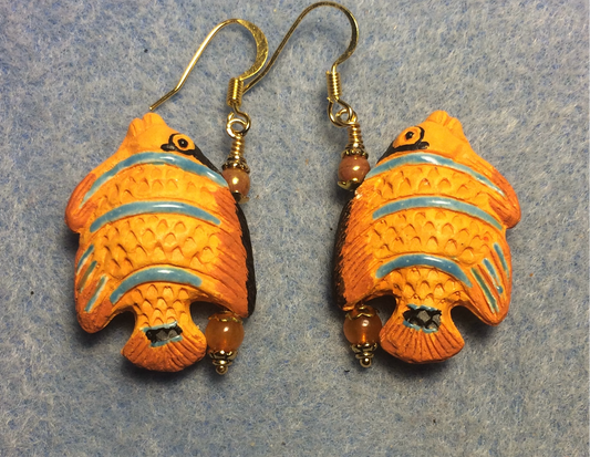 Orange and blue ceramic striped angelfish bead earrings adorned with orange Czech glass beads.