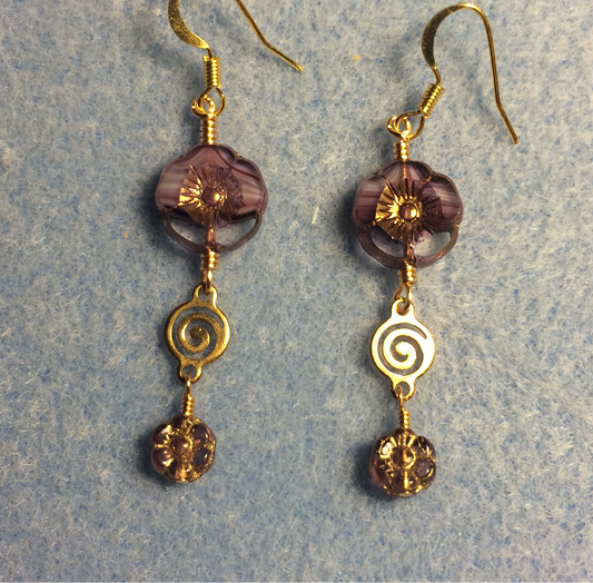 Purple Czech glass pansy bead earrings adorned with gold swirly connectors and tiny purple Czech glass daisy beads.