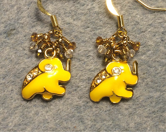 Vintage golden yellow enamel and rhinestone elephant charm earrings adorned with tiny dangling topaz and clear Chinese crystal beads.