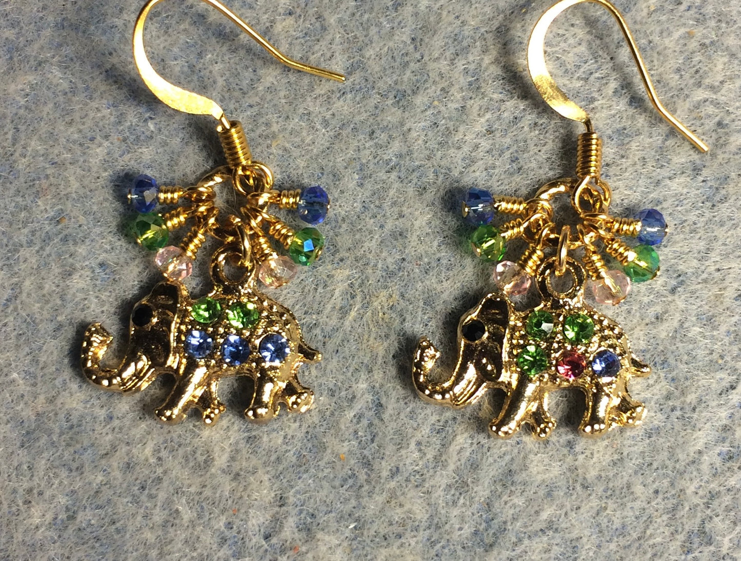 Gold and colorful rhinestone elephant charm earrings adorned with tiny dangling pink, green, and blue Chinese crystal beads.