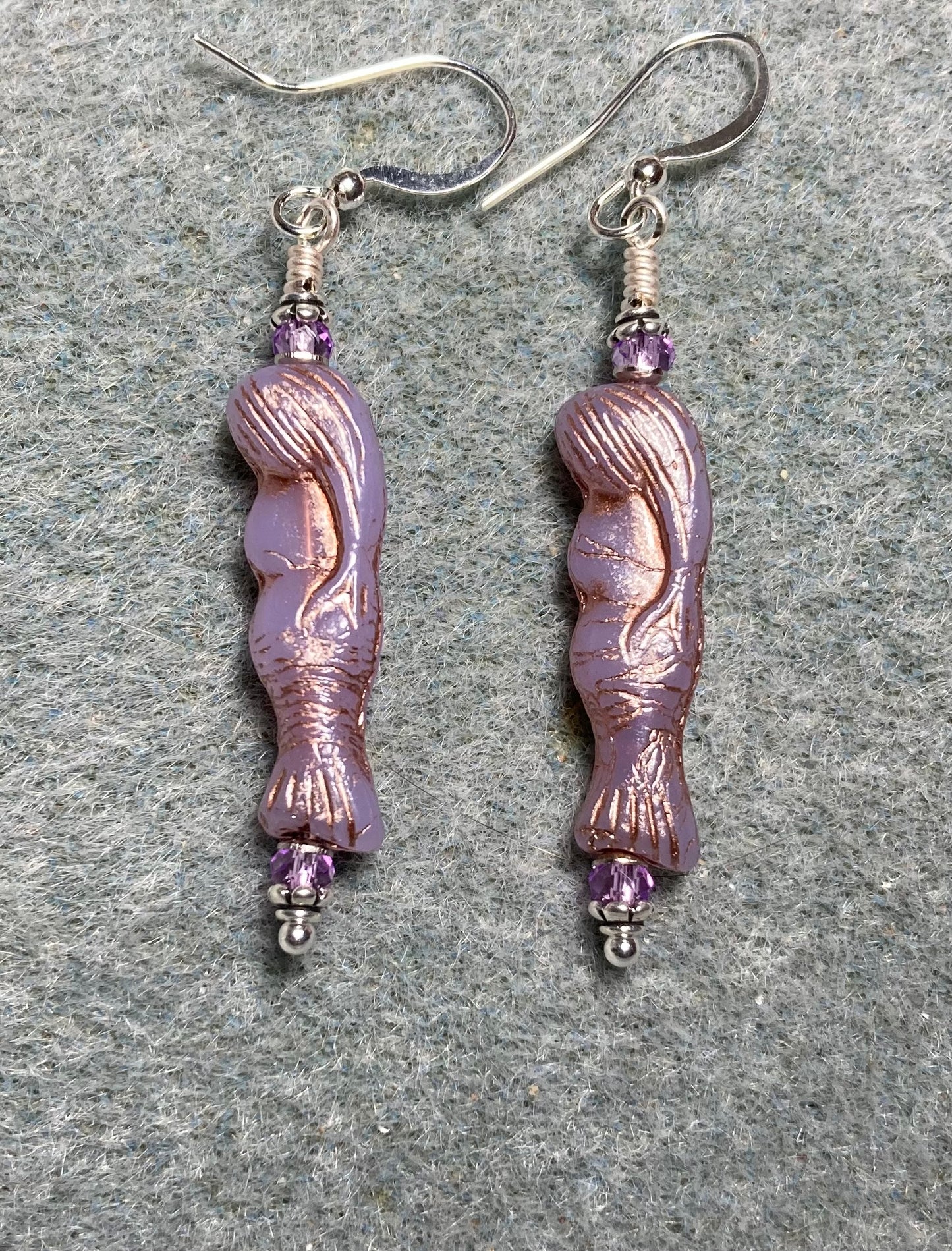 Light violet (with copper inlay) Czech glass mermaid bead earrings adorned with light violet Chinese crystal beads.