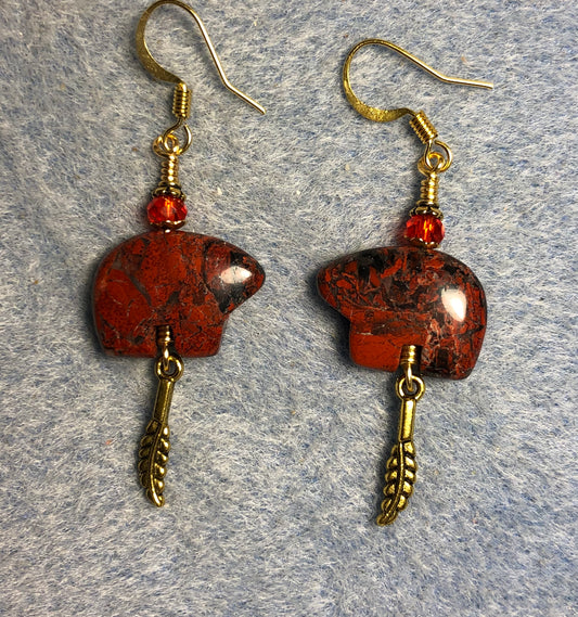 Red brecciated Jasper gemstone Zuni bear fetish bear earrings adorned with red crystal beads and tiny gold feather charms.