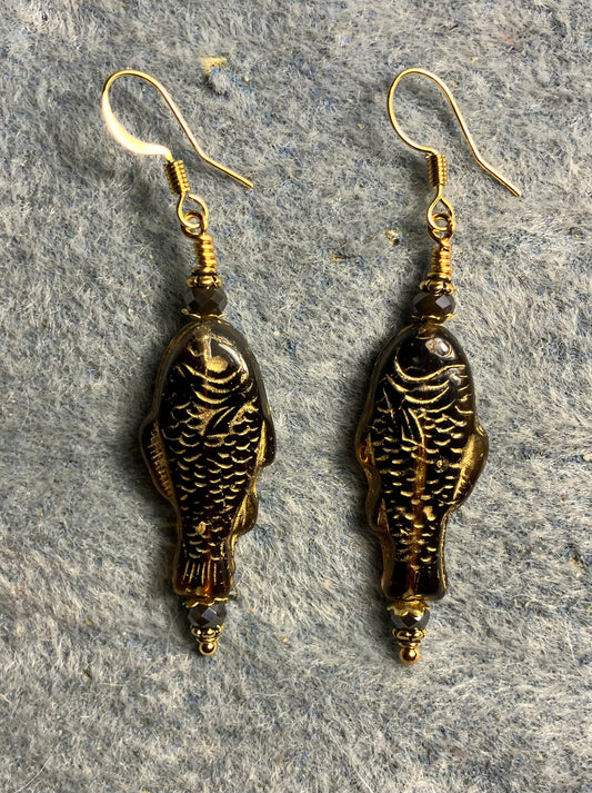 Brown (with gold inlay) Czech glass fish bead earrings adorned with brown Chinese crystal beads.