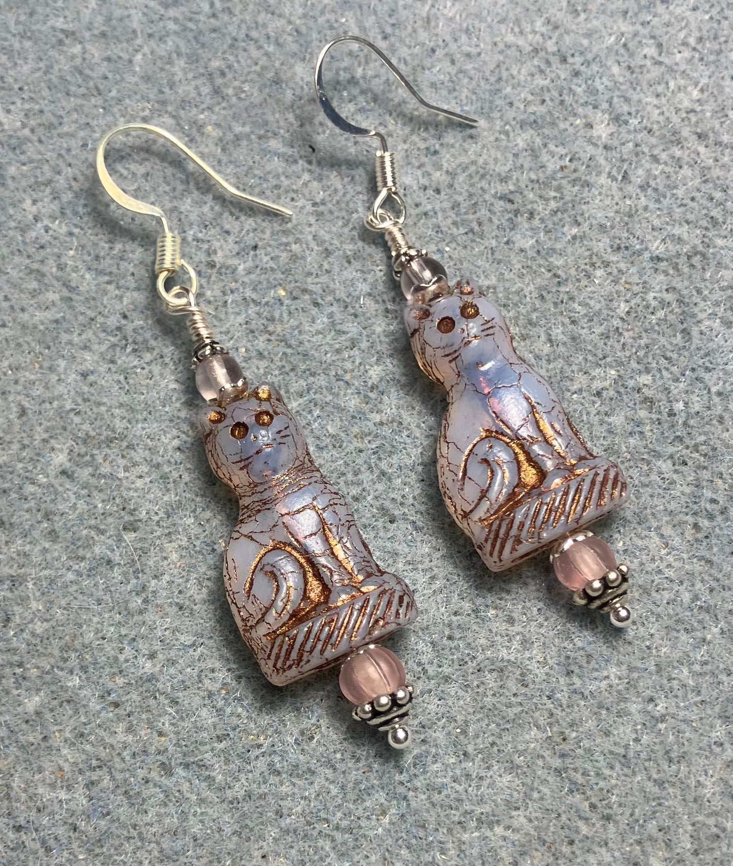 Translucent light violet (with copper inlay) fancy Czech glass cat bead earrings adorned with light violet Czech glass beads.
