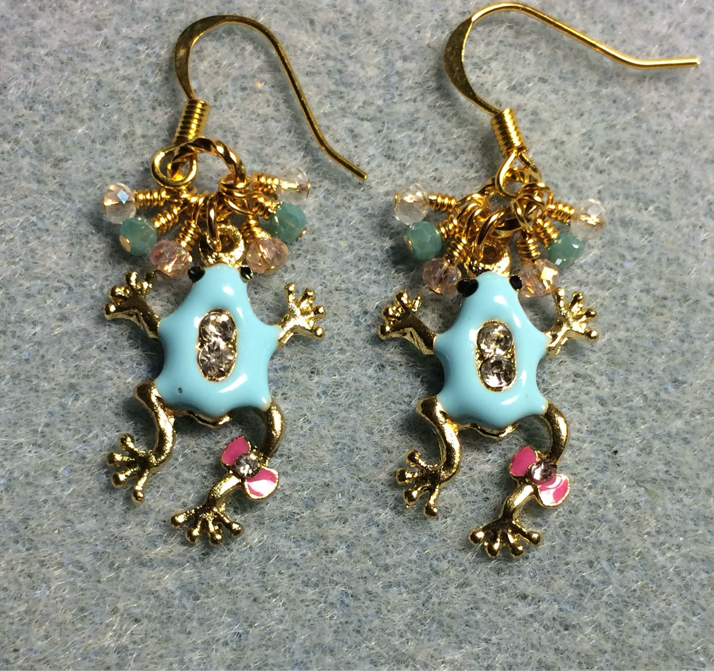 Turquoise and pink enamel and rhinestone frog charm earrings adorned with tiny dangling turquoise, pink, and clear Chinese crystal beads.