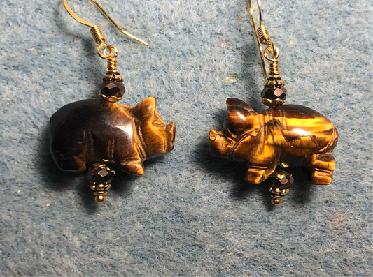 Brown tigereye gemstone pig bead earrings adorned with brown Chinese crystal beads.